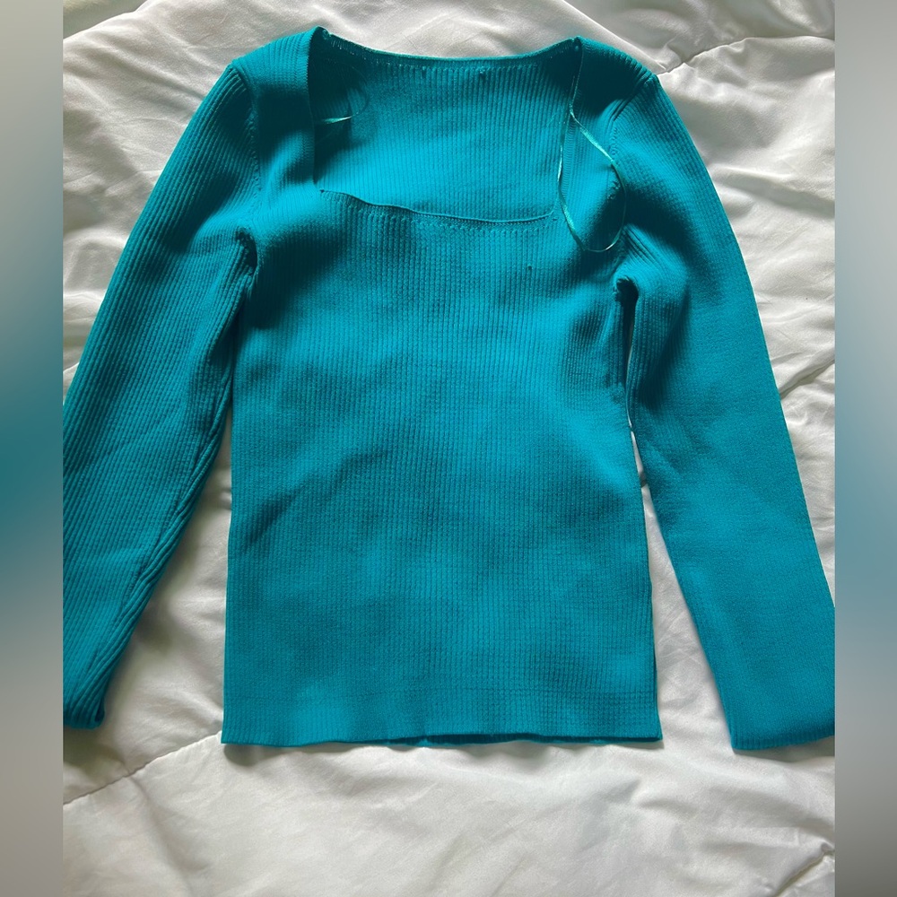 a beautiful blue color long sleeve top